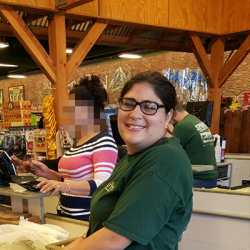 Candice working at Sprouts Family Market.