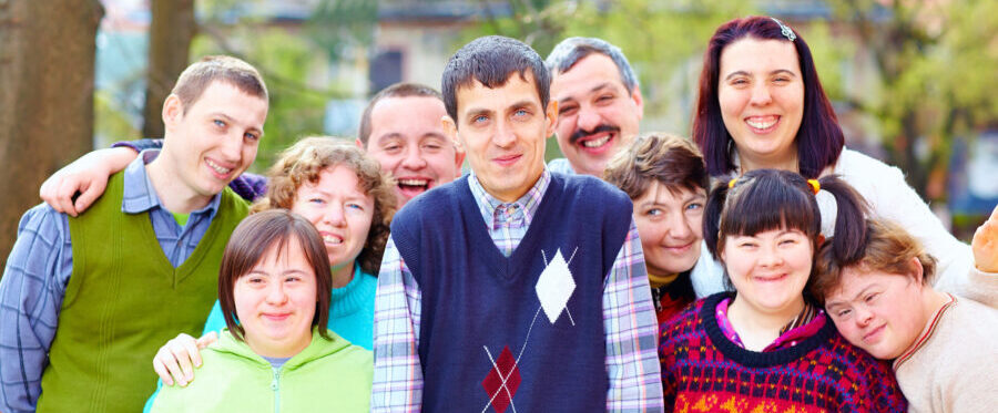 Group of happy people with disabilities